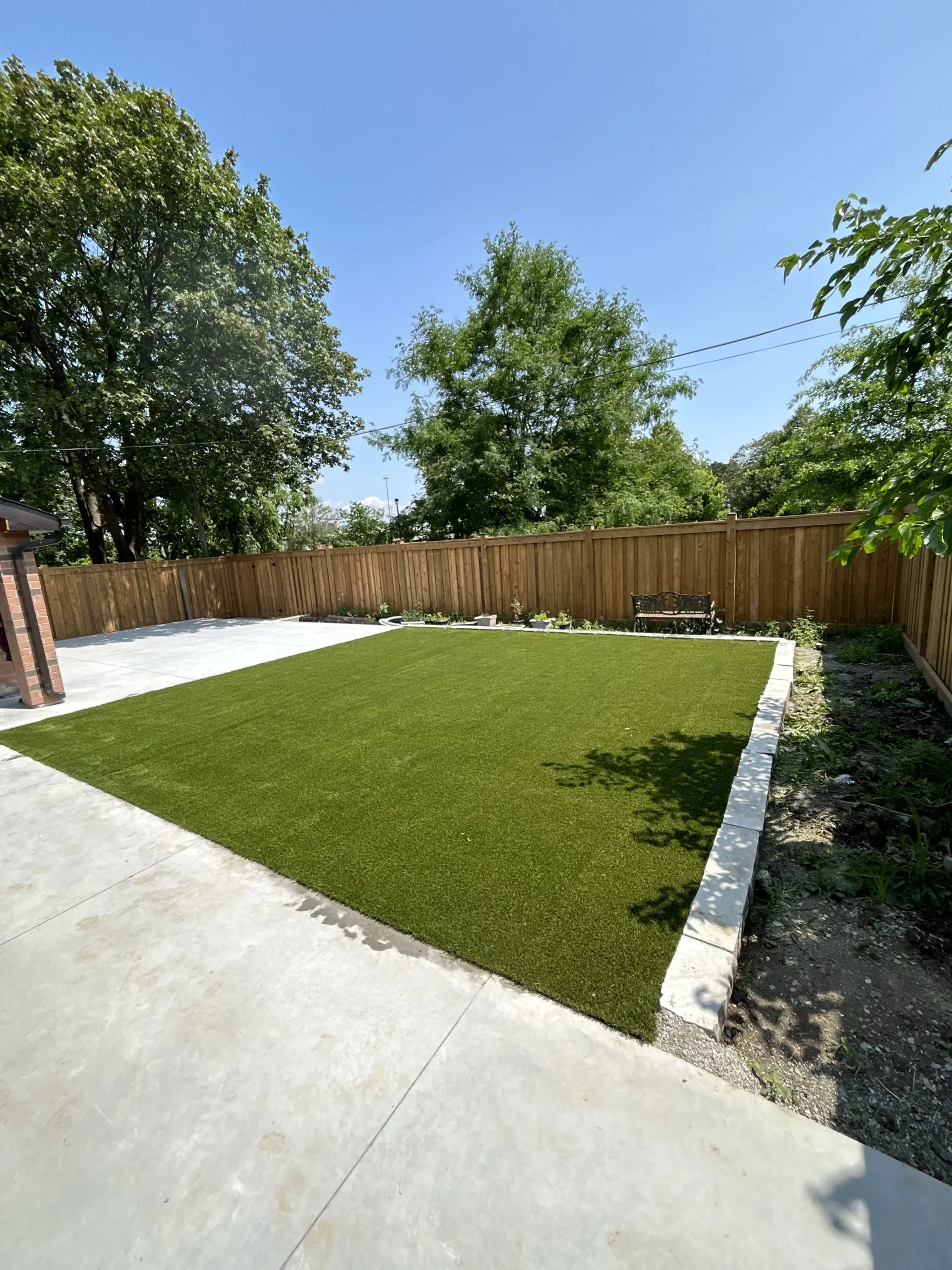Artificial grass side yard installation in Brampton
