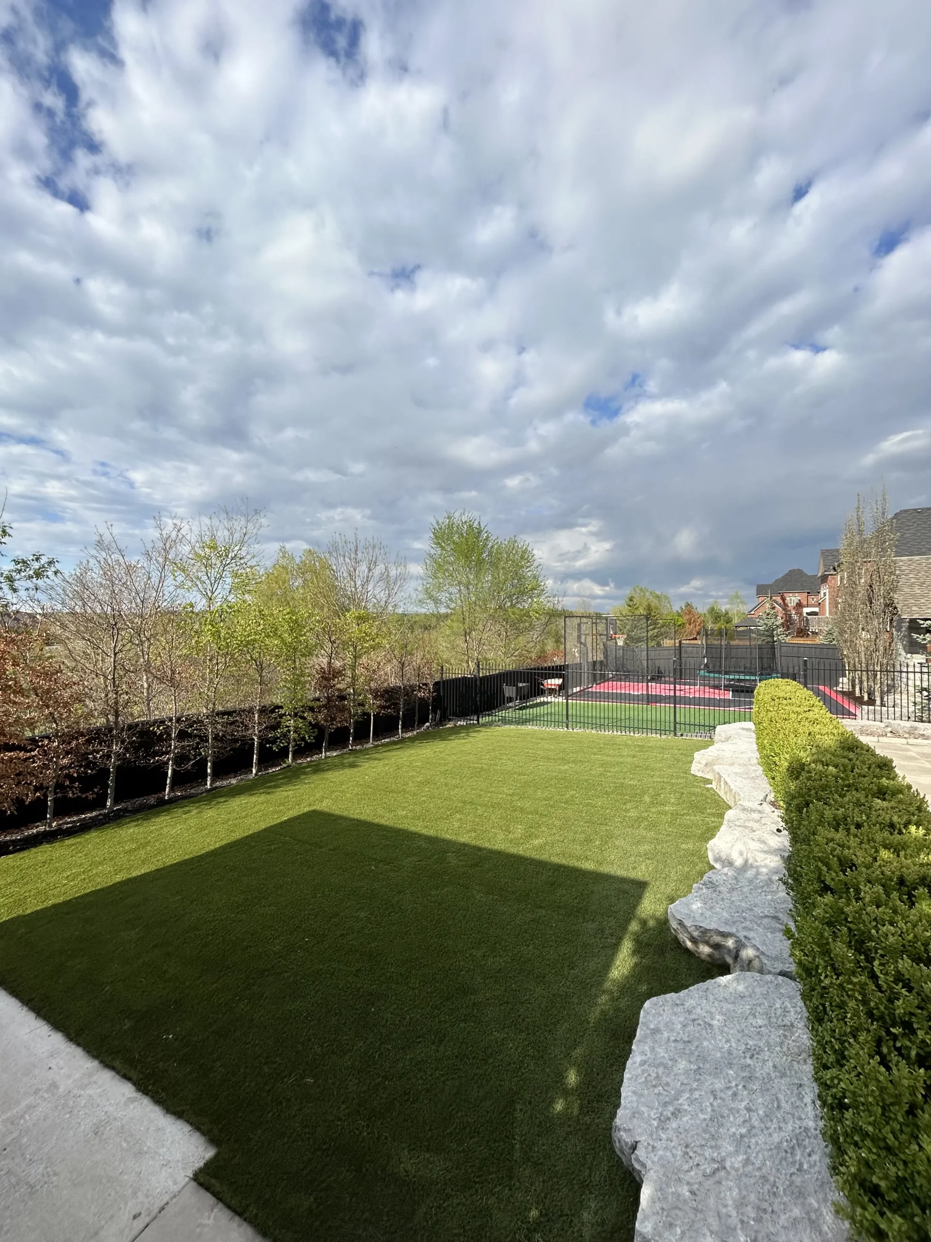 Backyard artificial turf installation in Toronto